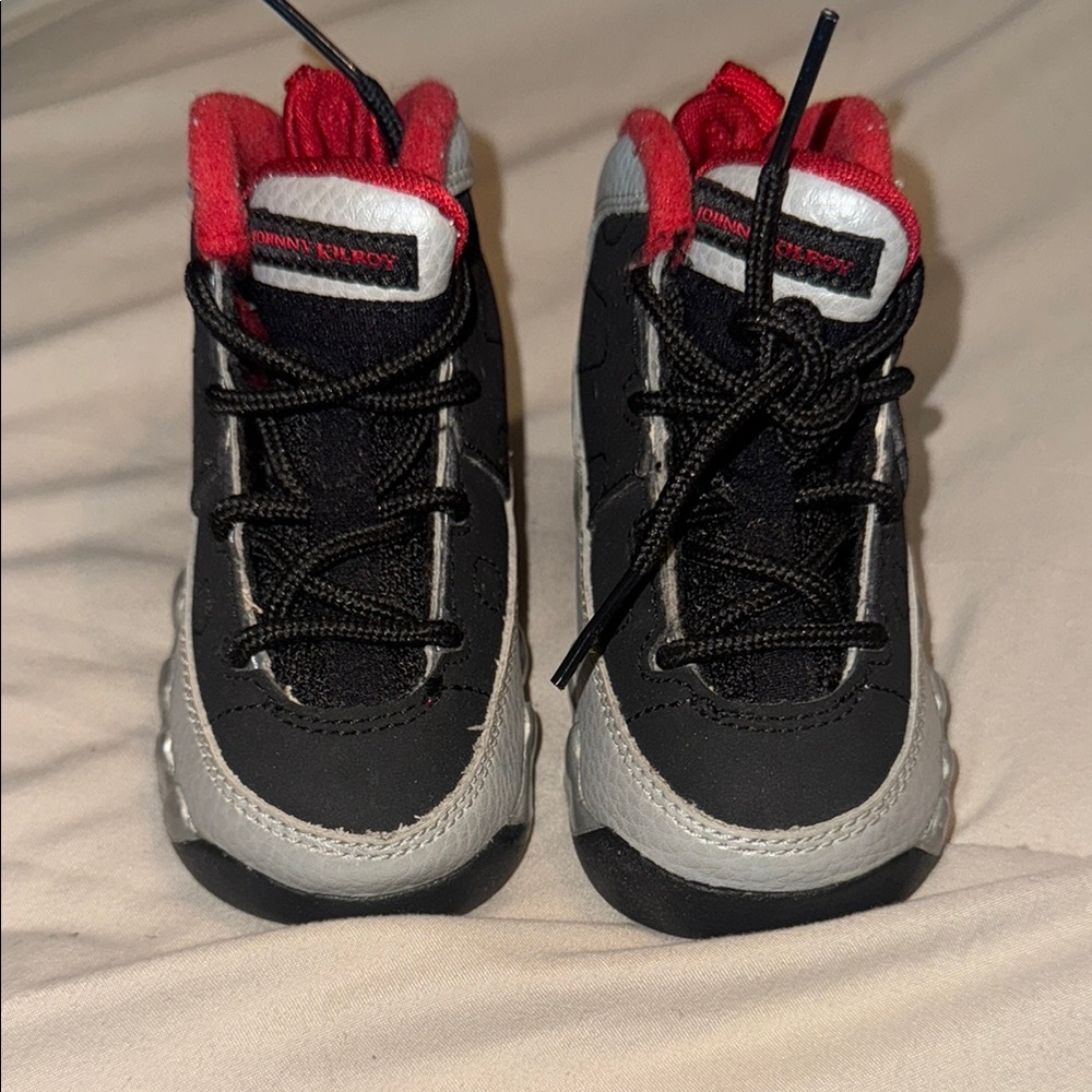 Kids Black and Red Jordan 9’s Sneakers